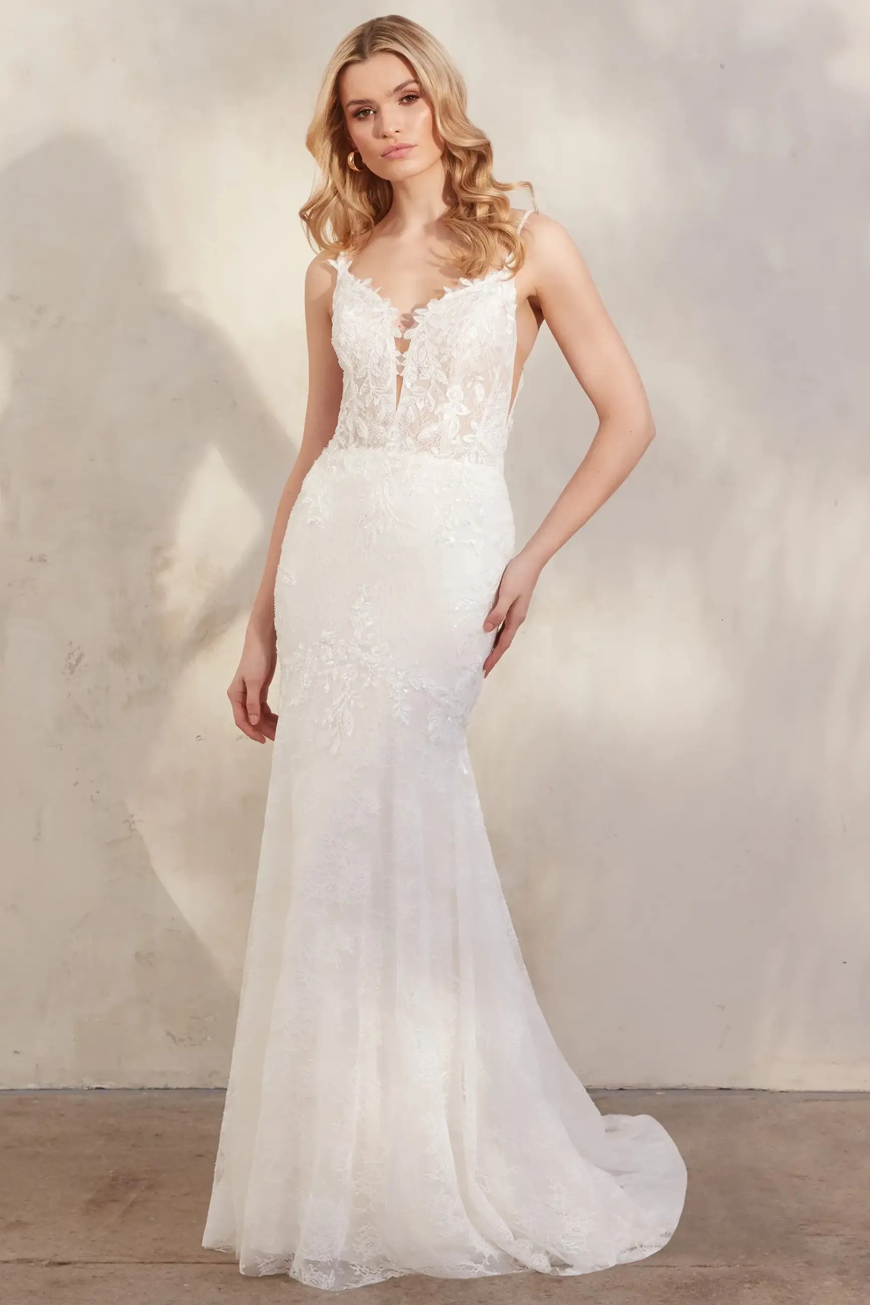 Model wearing a white gown