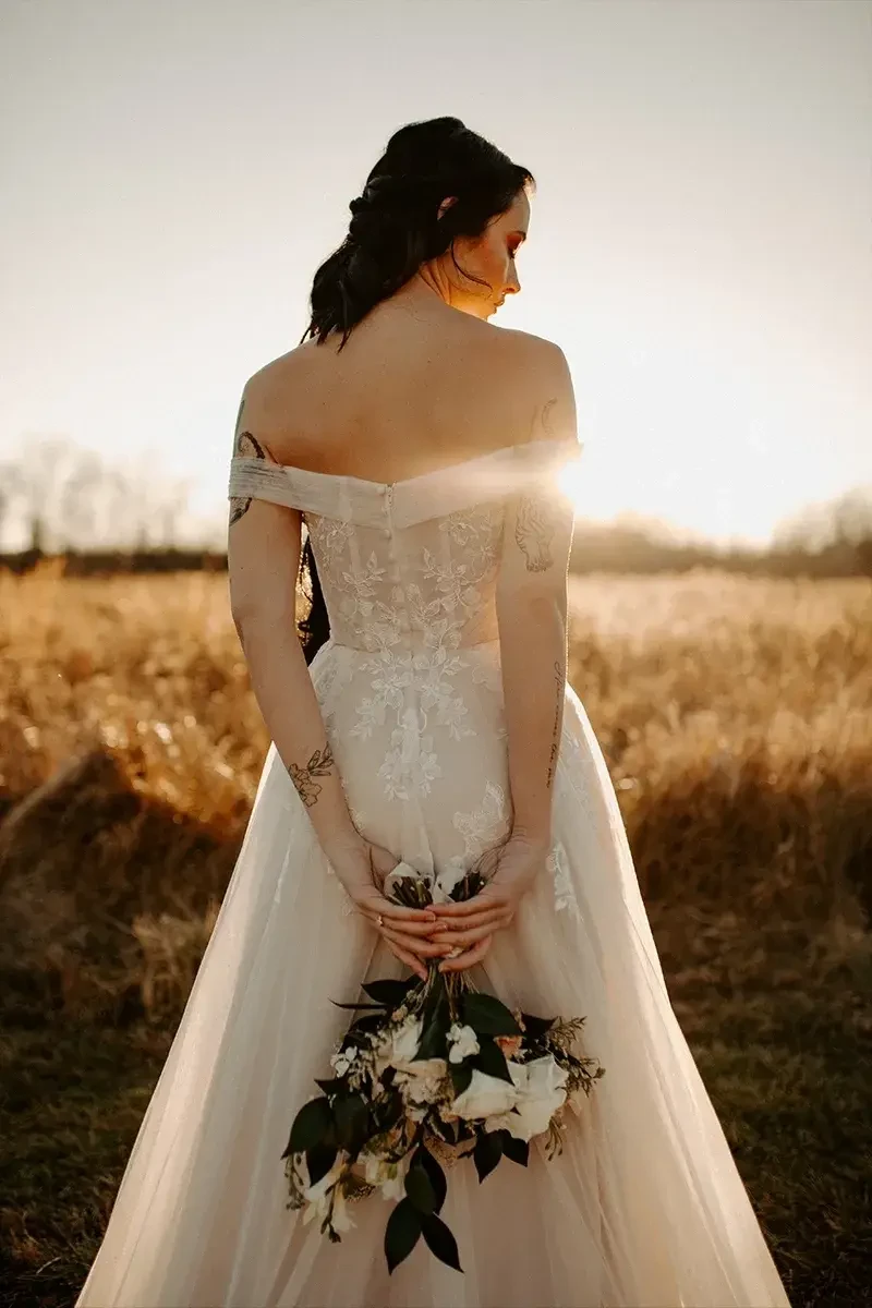 Model wearing a white gown