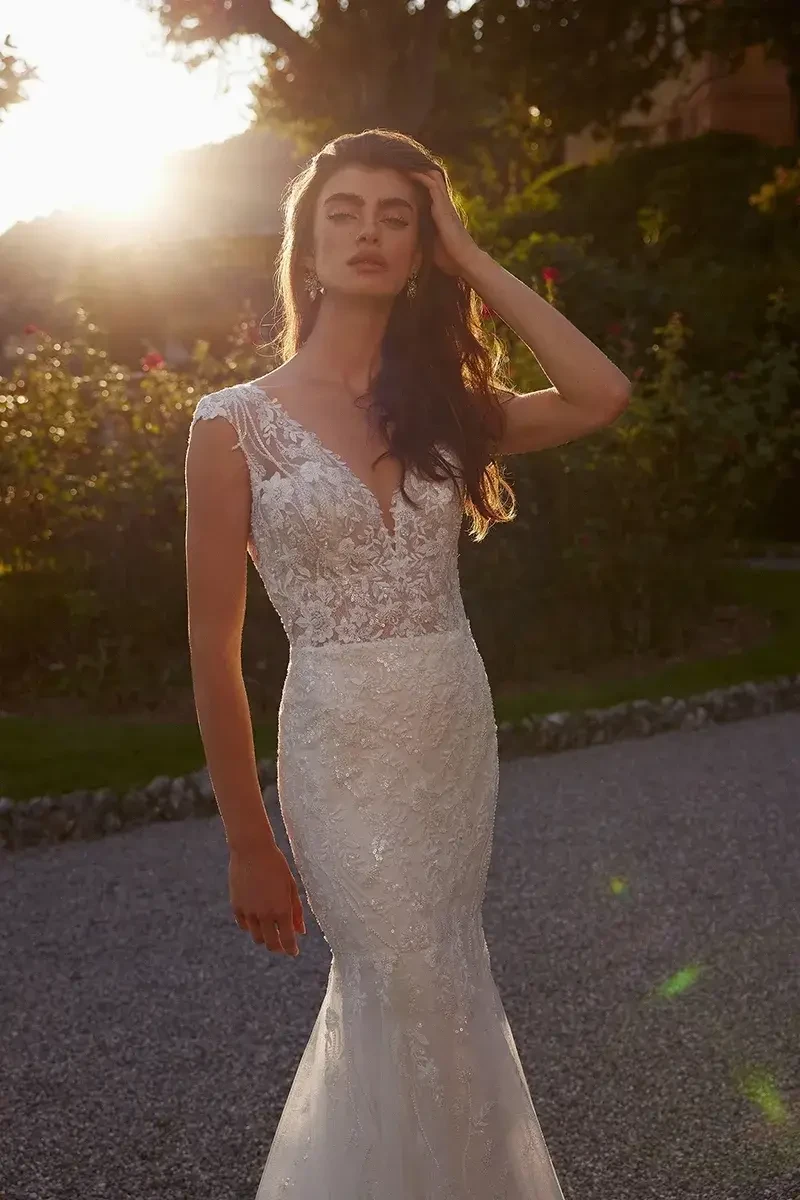 Model wearing a white gown