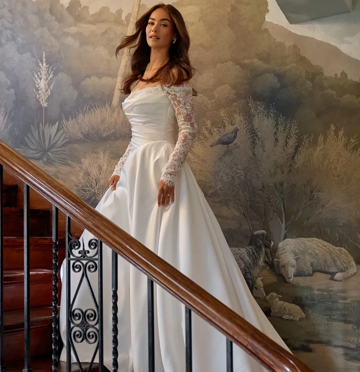 Model wearing a white gown by Essense of Australia